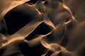 <center>Jeux d'ombres et de lumière entre les vagues d'un océan de sable. Sossusvlei. Dunes au soleil couchant. vu d'avion, Namibie. 